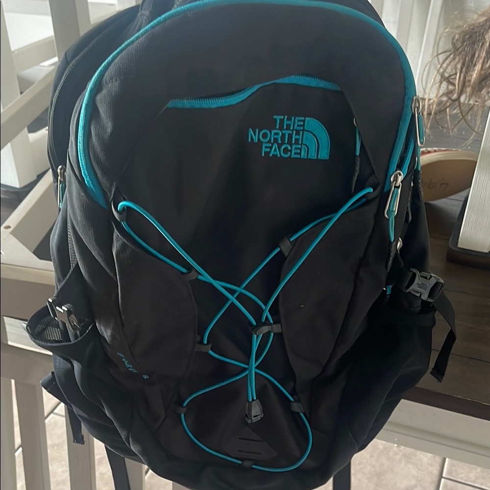 The North Face Black Backpack with Blue Trim